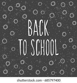 Back to school. Hand drawn lettering and doodle chalk elements on classroom chalkboard for design card, school poster, childish t shirt, autumn banner, scrapbook, album, school wallpaper etc