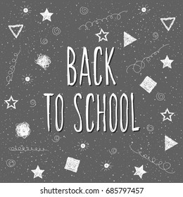 Back to school. Hand drawn lettering and doodle chalk elements on classroom chalkboard for design card, school poster, childish t shirt, autumn banner, scrapbook, album, school wallpaper etc