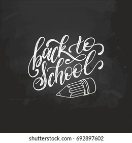 Back To School handwritten illustration with pencil drawing on chalkboard. Vector hand lettering. Children education background. Knowledge day poster.