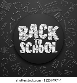 Back to school lettering in doodle circle on chalkboard background