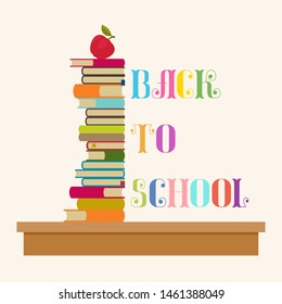 "Back to School" lettering. Many books on a school desk with an apple on top.  Vector illustration