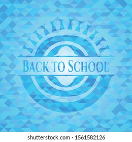 Back to School light blue emblem with triangle mosaic background