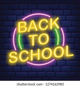 Back to school neon sign on dark brick background vector illustration