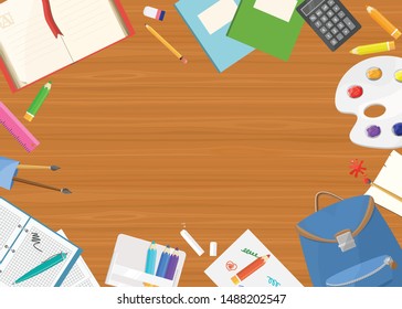 Back to school. School (office) supplies on wooden desk background.
