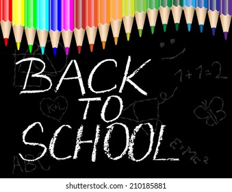 Back to school  on black chalkboard and color pencils