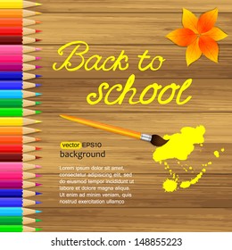 Back to school photo realistic wooden background with pencils, brush and autumn leaves