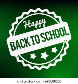 Back to School rubber stamp white on a green background.