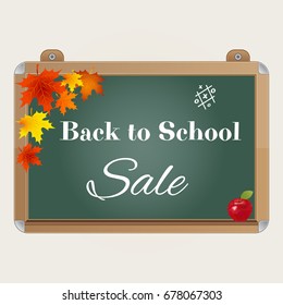 Back to school sale background with realistic blackboard, apple autumn leaves,and text