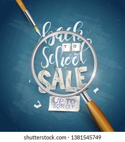 Back to school sale concept with lettering,  magnifier and paintbrush.