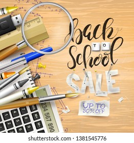 Back to school sale concept with with stationery on wooden desk. Promotion campaign template.