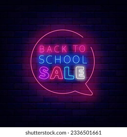 Back to school sale neon label. Speech bubble frame. Seson shopping promotion. Special offer banner. Education design. Light advertising on brick wall. Editing text. Vector stock illustration