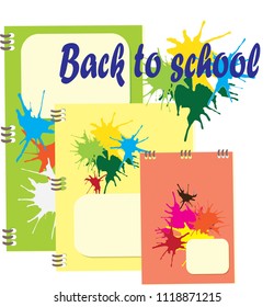 Back to school - set of notebooks with paint blot and text. Isolated, white background, school supplies, objects, tools