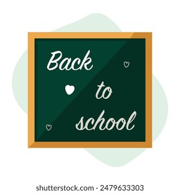 Back to school sign on classroom blackboard.