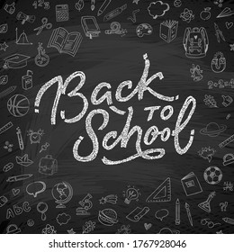 Back to school text drawing by white chalk in black blackboard with school items and elements doodle style. Vector illustration banner.