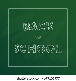 Back to school text drawing by chalk in blackboard.