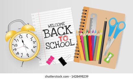 Back to school text on notepaper with alarm clock, notebook, crayon, pencil, scissors, ruler, sharpener and paperclip on gray background. Education concept
