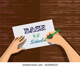 Back to school themed concept design. Hands writing phrase back to school on the paper. Stock vector in flat - Shutterstock ID 422496514