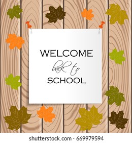 Back to School Title Words on Paper Note. Wooden Background with Colored Leaves. Vector Illustration