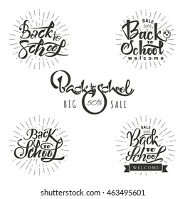 Back to school typographic labels set. Isolated vector elements. Usable for greeting cards, posters, banners. First day of school sticker and badges. Calligraphy, lettering design. 