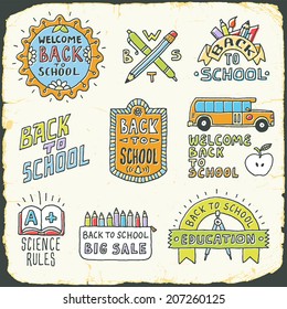 Back to school vintage doodle lettering signs set on carton card. Hand drawn vector illustration.