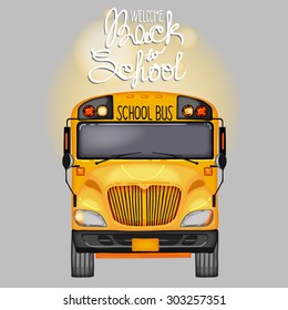 Back to school. Yellow school bus in front view. 