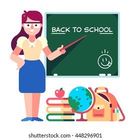 Back to school. Young teacher and school items.