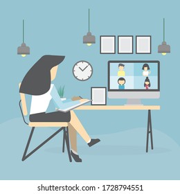 Back view of businesswoman speak using Webcam conference on a computer with diverse colleagues And working at homework through computer And the internet 