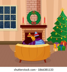Vista Atrás De La Pareja Sentada En El Sofá Frente A La Chimenea Con Decorativo Árbol De Xmas Y Cajas De Regalos En El Interior.