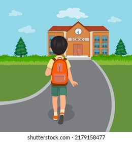 back view of cute little boy student with backpack walking going to school