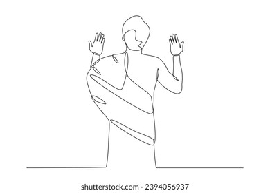Back view of a man praying in Mecca. Hajj one-line drawing