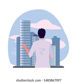 back view of a man standing in the city