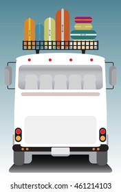 Back view of old bus and bag on roof