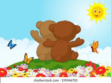 Back view of two teddy bears sitting in the garden