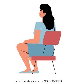 back view woman on chair icon