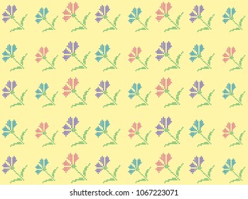 Backdrop with a pattern of cross stiched flowers