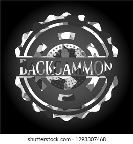 Backgammon written on a grey camouflage texture