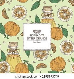 Background with bitter orange: bigaradia fruit, leaves, bitter orange slice and bottle of bigaradia essential oil. Citrus aurantium. Cosmetic, perfumery and medical plant