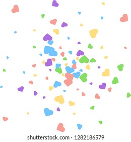 Background from bright multi-colored confetti. Festive confetti in the form of hearts. Joyful confetti on a white background.