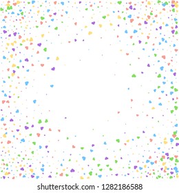 Background from bright multi-colored confetti. Festive confetti in the form of hearts. Joyful confetti on a white background.
