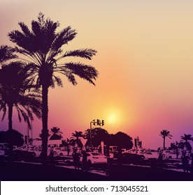 Background with buildings and palms in Dubai city, United Arab Emirates. Travel concept.