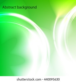 Background of the circles with the glow effect . Circles of light with a magical glow . Green abstract background .