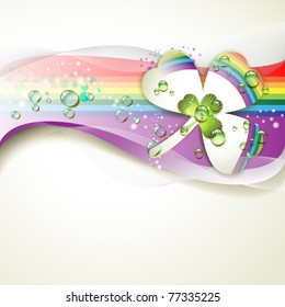 Background with clover and drops of water over rainbow