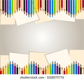 Background of colored pencils and paper.
