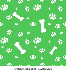 Background with dog paw print and bone on green