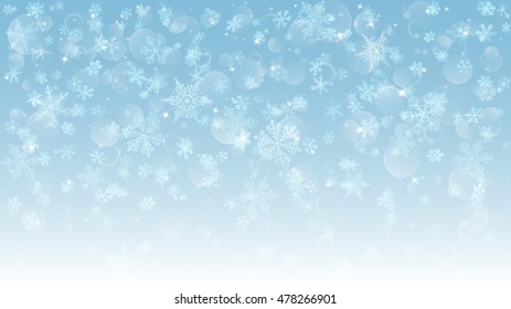Background of falling white snowflakes on light blue