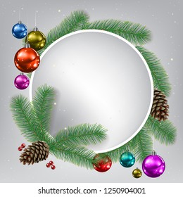 Сhristmas background with fir branches and decorations on gray