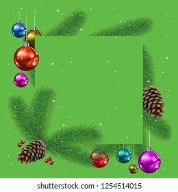 A Сhristmas background with fir branches and decorations on green