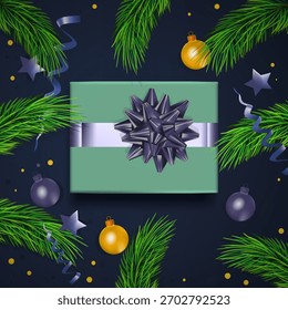 Saudações de fundo vista superior com ramos de árvore de pele, bolas e presente no centro. Decoração conceito de Natal na moda fundo azul escuro.