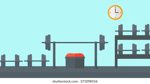 Background of gym with equipment.