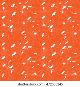 Background for Halloween. Bats and spiders on the web. Seamless patern